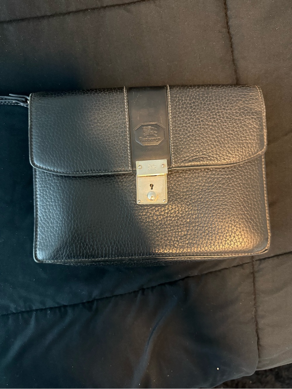 Burberry Black Textured Leather Clutch with Gold-Tone Lock